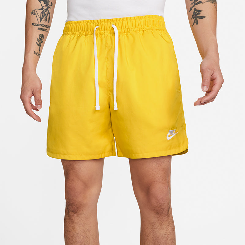 Nike Men's Sportswear Essential Woven Lined Flow Shorts.