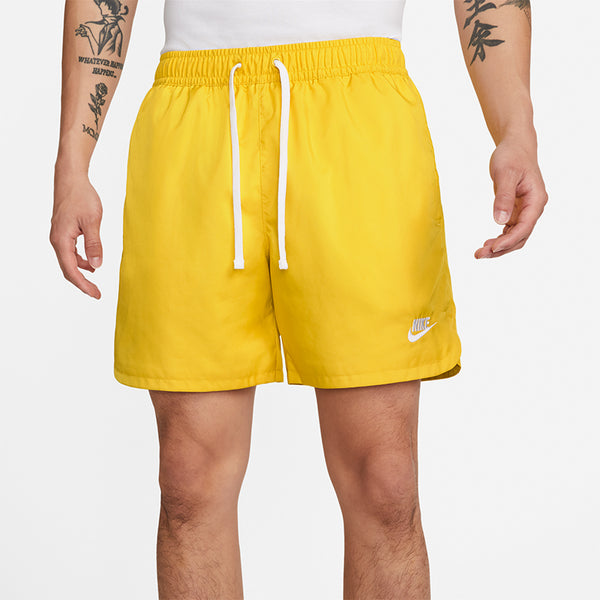 Nike Men's Sportswear Essential Woven Lined Flow Shorts.