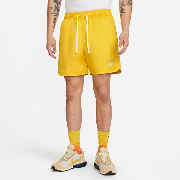 Nike Men's Sportswear Essential Woven Lined Flow Shorts.